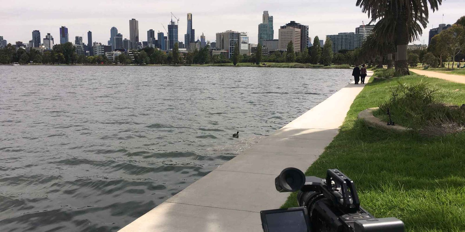 Camera filming by the lake at Albert Park, Melbourne